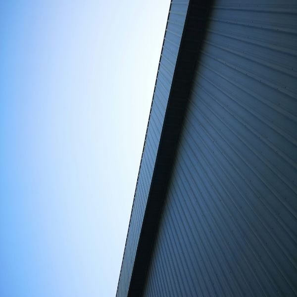 industrial building against a blue sky
